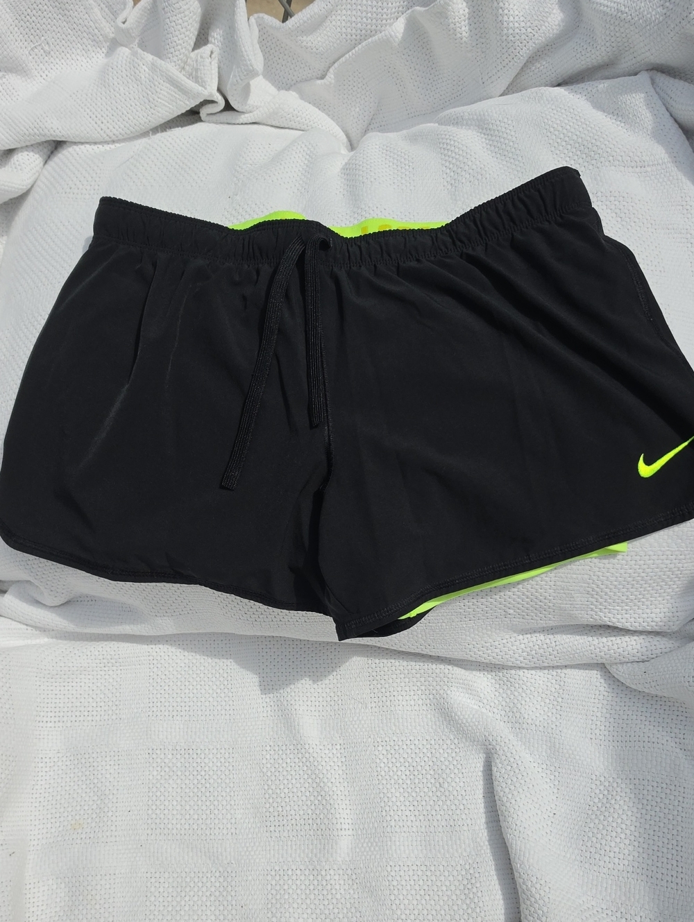 Nike Women’s Black Athletic Shorts with Neon Green Trim